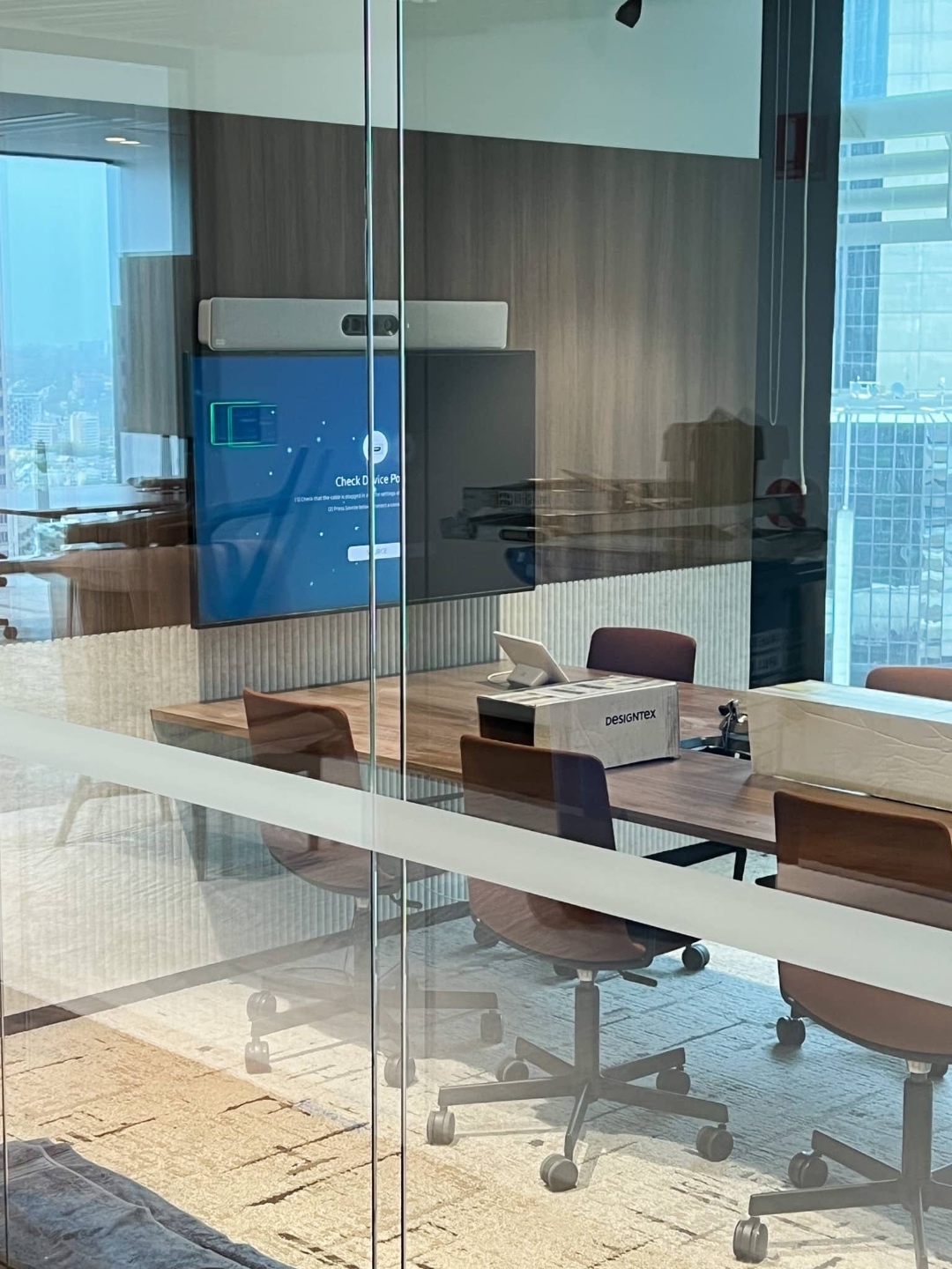 Meeting room glass with a mid-height dusted band that hides the room behind while looking like plain glass at a glance