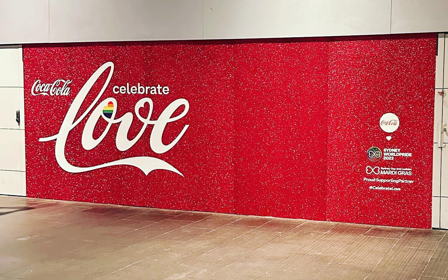 Coca-Cola Celebrate Love glitter-red event wall for Sydney WorldPride