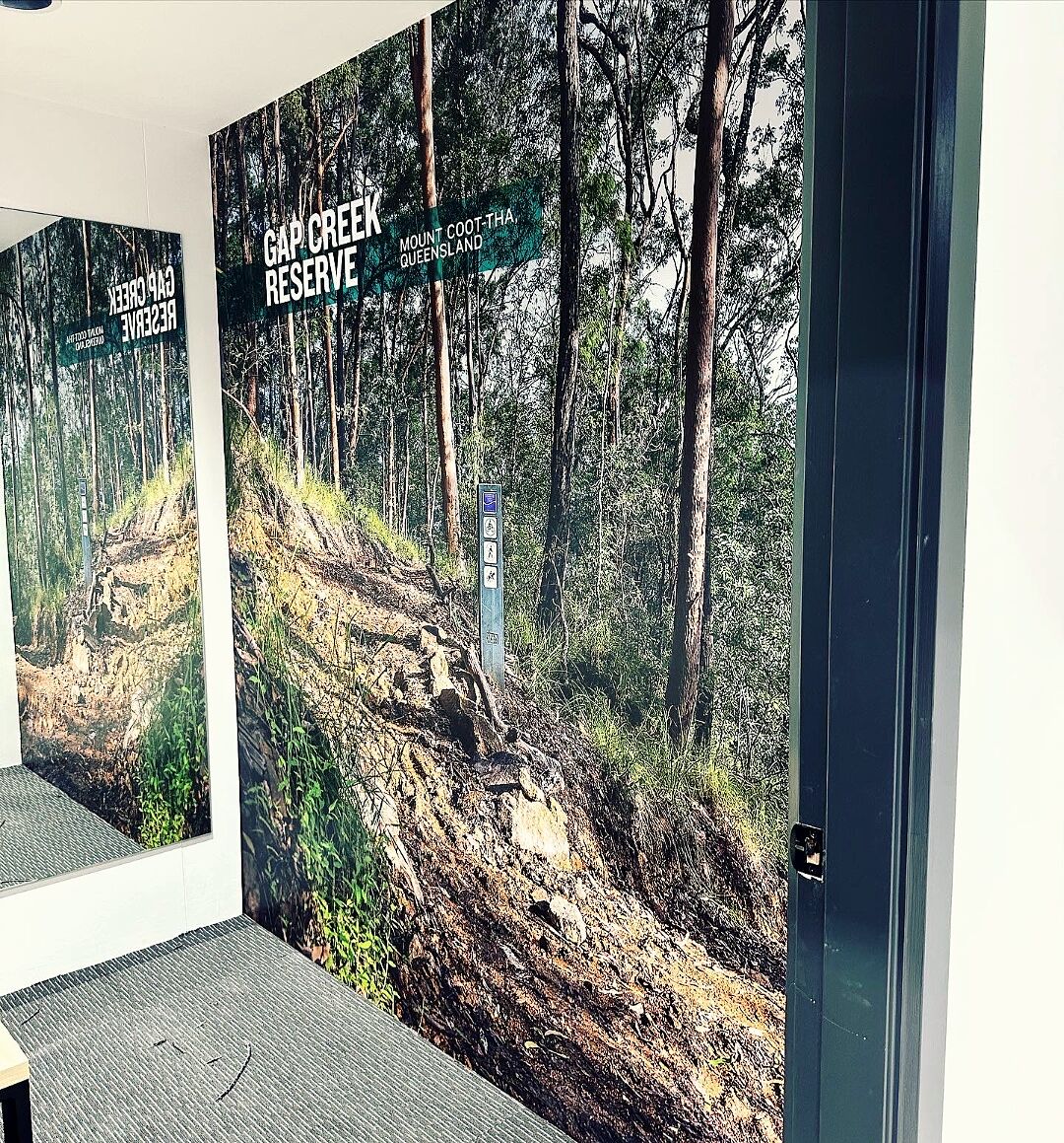 Floor-to-ceiling nature photo wall mural in changing rooms
